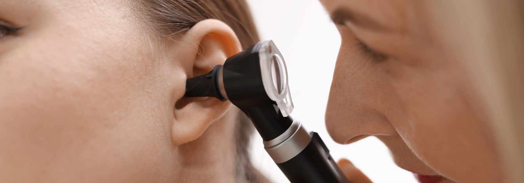 A professional cleaning earwax